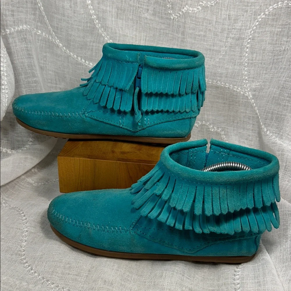 Minnetonka leather fringe moccasins with side zipper